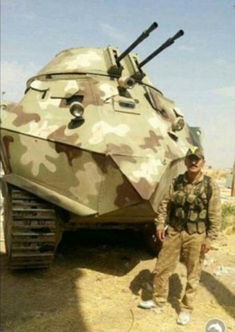 Xem xe bọc thép tự chế siêu dị của ISIS tại Iraq - Ảnh 2 Xem xe boc thep tu che sieu di cua ISIS tai Iraq - Anh 2