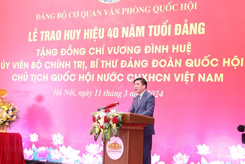 Tổng Thư ký Quốc hội, Chủ nhiệm Văn phòng Quốc hội Bùi Văn Cường phát biểu khai mạc. (Ảnh: Nhan Sáng/TTXVN)