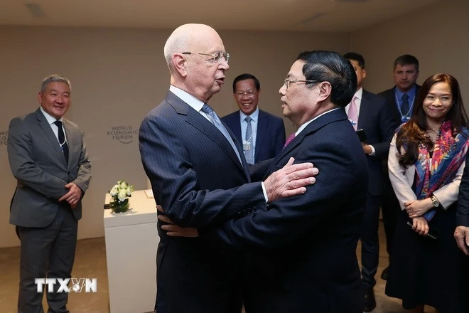 Thủ tướng Phạm Minh Chính gặp Giáo sư Klaus Schwab, Người sáng lập kiêm Chủ tịch Điều hành Diễn đàn Kinh tế Thế giới, hồi tháng 1/2024. (Ảnh: Dương Giang/TTXVN) Thủ tướng Phạm Minh Chính gặp Giáo sư Klaus Schwab, Người sáng lập kiêm Chủ tịch Điều hành Diễn đàn Kinh tế Thế giới, hồi tháng 1/2024. (Ảnh: Dương Giang/TTXVN)