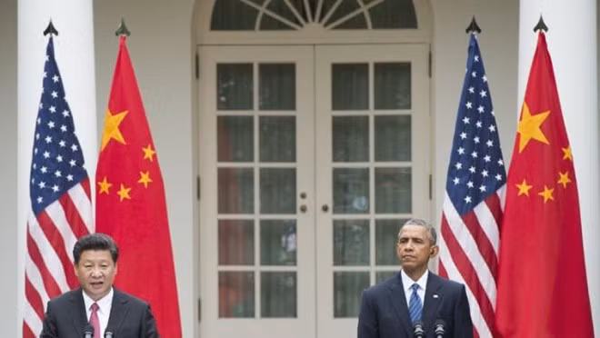 Chủ tịch Tập Cận Bình và Tổng thống Obama phát biểu tại cuộc họp báo ở Vườn hồng, Nhà Trắng, ngày 25/9. Ảnh: AFP
