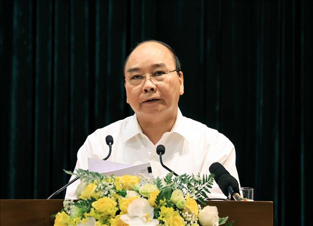 Chủ tịch nước Nguyễn Xuân Phúc: Kiên quyết thay thế người đứng đầu đơn vị, địa phương nếu để tội phạm lộng hành - Ảnh: TTXVN.
