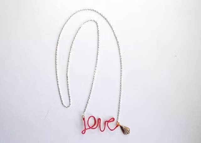 Dây chuyền với mặt chữ tết handmade.