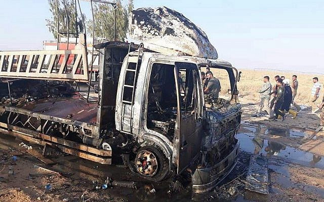 Hiện trường sau một vụ tấn công ở Syria.
