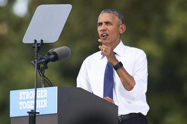 Bà Clinton ốm, ông Obama thay mặt vận động tranh cử