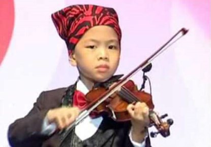 Cậu bé 11 tuổi đa tài nhất thế giới ảnh 2