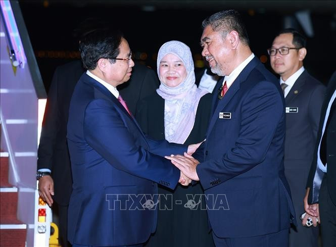 Lễ đón Thủ tướng Phạm Minh Chính tại sân bay quốc tế Kuala Lumpur. Ảnh: Dương Giang/TTXVN Lễ đón Thủ tướng Phạm Minh Chính tại sân bay quốc tế Kuala Lumpur. Ảnh: Dương Giang/TTXVN