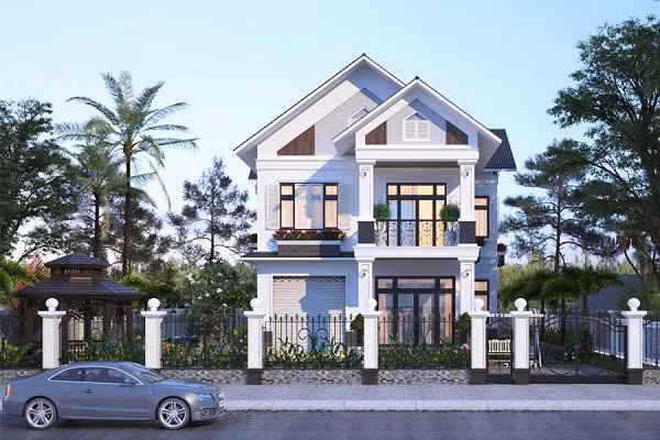 Biệt thự 2 tầng theo phong cách hiện đại với tông màu trắng chủ đạo đi kèm với chất liệu kính để bắt ánh sáng cho không gian bên trong.