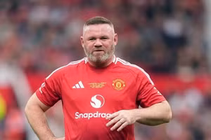 Wayne Rooney không hài lòng với lối chơi của các cầu thủ Man United.