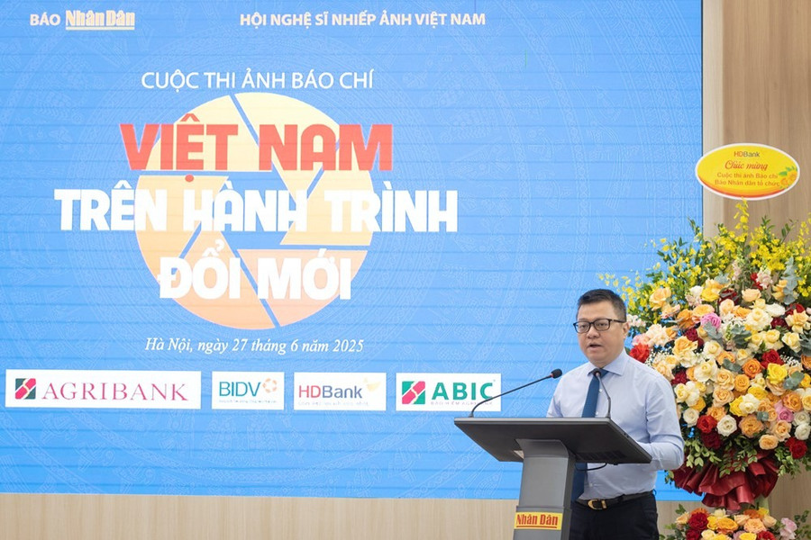 Tổng Biên tập Báo Nhân Dân Lê Quốc Minh thông tin tại lễ phát động. stnd6057-gtbn.jpg