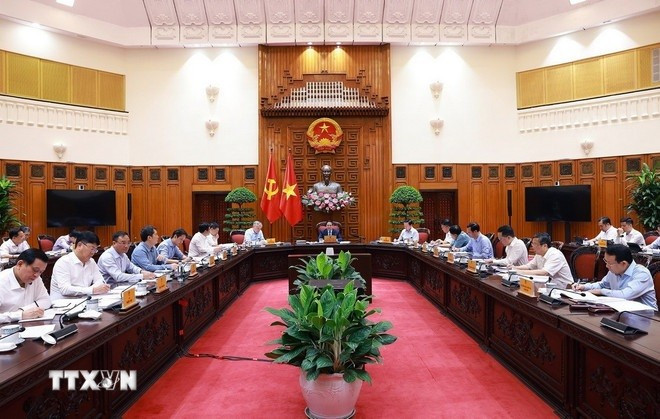Thủ tướng Phạm Minh Chính chủ trì cuộc họp với các bộ, ngành để chuẩn bị đàm phán thương mại với Hoa Kỳ. (Ảnh: Dương Giang/TTXVN) thu-tuong-dam-phan-thuong-mai-voi-hoa-ky-tren-tinh-than-hai-hoa-loi-ich-hai-ben-3.jpg