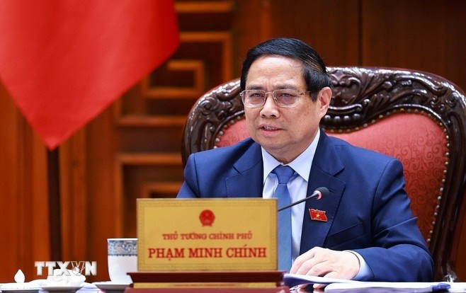 Thủ tướng Phạm Minh Chính chủ trì cuộc họp với các bộ, ngành để chuẩn bị đàm phán thương mại với Hoa Kỳ. (Ảnh: Dương Giang/TTXVN) thu-tuong-dam-phan-thuong-mai-voi-hoa-ky-tren-tinh-than-hai-hoa-loi-ich-hai-ben-2.jpg