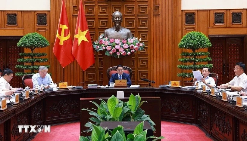 Thủ tướng Phạm Minh Chính chủ trì cuộc họp với các bộ, ngành để chuẩn bị đàm phán thương mại với Hoa Kỳ. (Ảnh: Dương Giang/TTXVN)