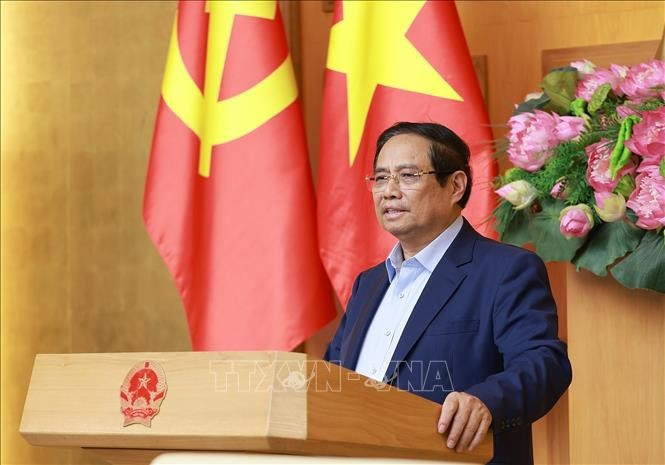 Thủ tướng Phạm Minh Chính phát biểu tại buổi làm việc với Ban Nghiên cứu phát triển kinh tế tư nhân (Ban IV). (Ảnh: Dương Giang/TTXVN)