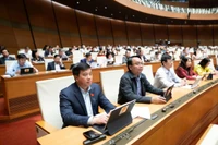 Các đại biểu Quốc hội tham gia Phiên họp và biểu quyết thông qua dự thảo Luật Giáo dục đại học (sửa đổi).