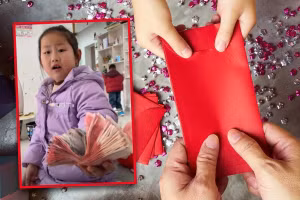 Bé gái 7 tuổi tặng toàn bộ số tiền mừng tuổi cho mẹ như một lời cảm ơn. Ảnh: SCMP.