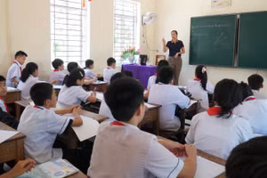 Giờ dạy học của cô Phạm Thị Hằng tại Trường THCS Thị trấn 2 (Vạn An, Nghệ An). Ảnh: Ngọc Sơn