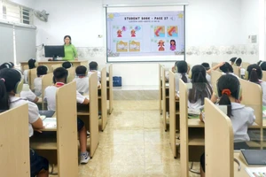 Học sinh Trường Tiểu học Hồ Văn Huê trong giờ học. Ảnh: NTCC