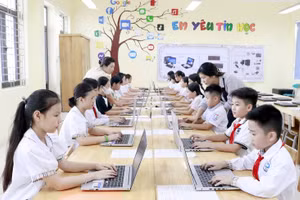 Đẩy mạnh ứng dụng công nghệ thông tin trong giáo dục và đào tạo. Ảnh: TTXVN