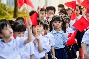 Học sinh Trường tiểu học Nguyễn Tất Thành (Nam Định, Ninh Bình) trong ngày khai giảng năm học 2024 - 2025. 