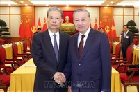 Tổng Bí thư Tô Lâm và Ủy viên trưởng Nhân đại toàn quốc Trung Quốc Triệu Lạc Tế. Ảnh: Thống Nhất/TTXVN.