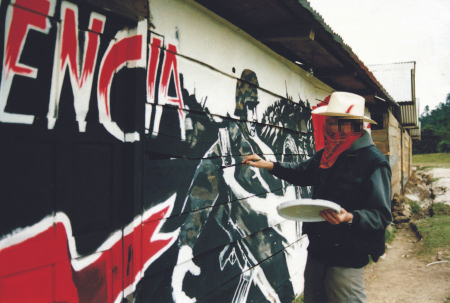 Banksy vẽ tranh trên vách ván khu nhà ổ chuột Mexico