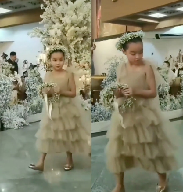 Cô bé tự tin trước đám đông khi đảm nhận vai trò quan trọng trong đám cưới của diễn viên Luane Dy-Gonzalez. Cô bé tự tin trước đám đông khi đảm nhận vai trò quan trọng trong đám cưới của diễn viên Luane Dy-Gonzalez.