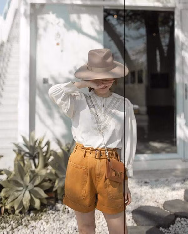 Áo blouse và quần lửng ống rộng là gợi ý tiếp theo cho nàng diện đi làm.