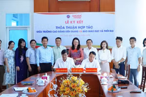 Lễ ký kết thỏa thuận hợp tác giữa Trường Cao đẳng Kiên Giang và Báo Giáo dục và Thời đại.