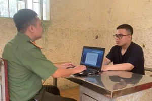 Trần Quang Huy tại cơ quan điều tra. (Ảnh CAHT)