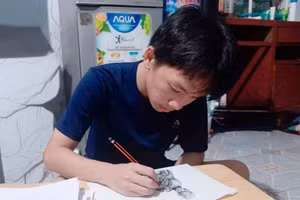 Nam sinh đã có thể cầm bút, tiếp tục ước mơ trở thành họa sĩ.