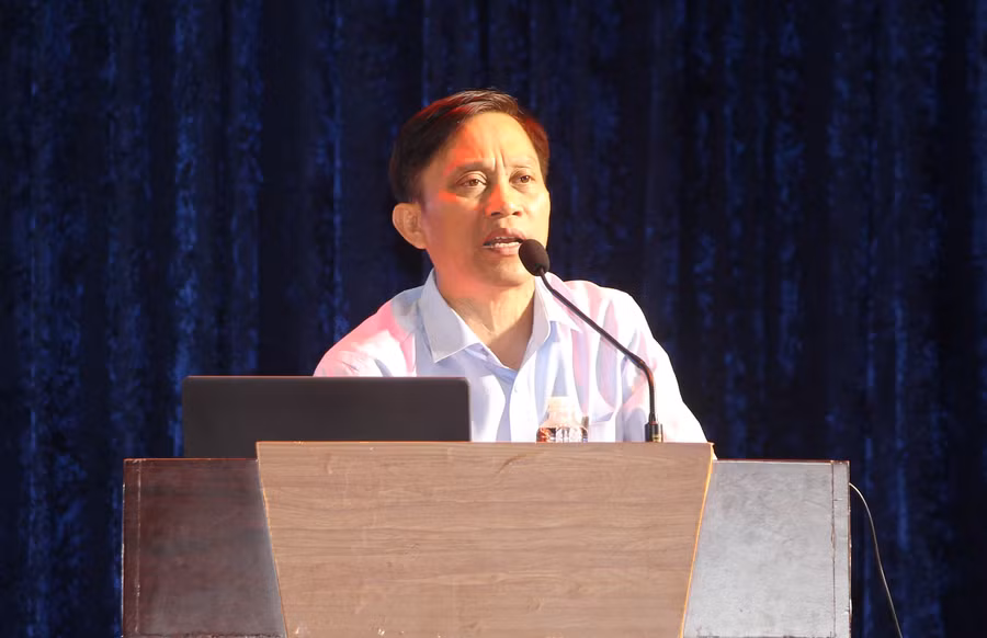 Tiến sĩ Phạm Văn Quốc thông tin tại hội nghị.