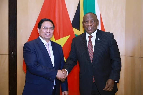 Thủ tướng Phạm Minh Chính hội kiến Tổng thống Cộng hòa Nam Phi Matamela Cyril Ramaphosa. (Ảnh: Dương Giang/TTXVN)