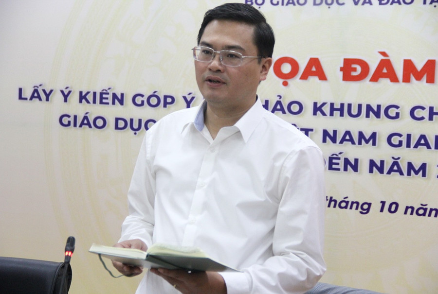 Ông Đặng Văn Huấn - Phó Vụ trưởng Vụ Giáo dục đại học (Bộ GD&ĐT) phát biểu tại Tọa đàm. khungchienluoc-1.jpg