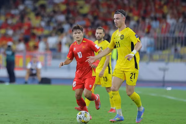 Trận Malaysia (bên phải) 4-0 Việt Nam, vòng loại ASIAN Cup 2027 ngày 10/6. Ảnh: INT