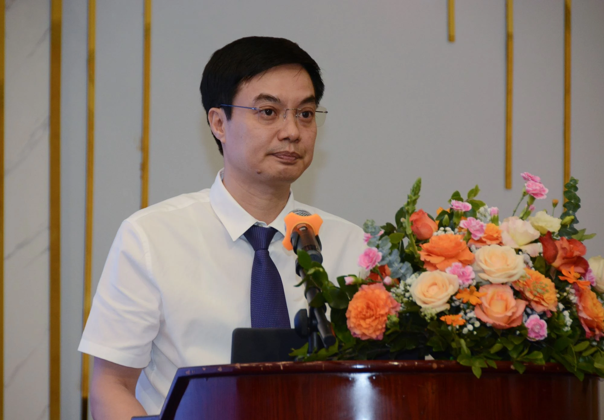 Giám đốc Chương trình phát triển Giáo dục trung học giai đoạn 2 Đồng Xuân Trường báo cáo kết quả triển khai.