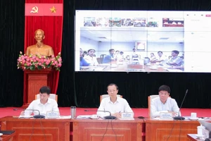 Thứ trưởng Thường trực Phạm Ngọc Thưởng chủ trì thảo luận tại hội nghị.