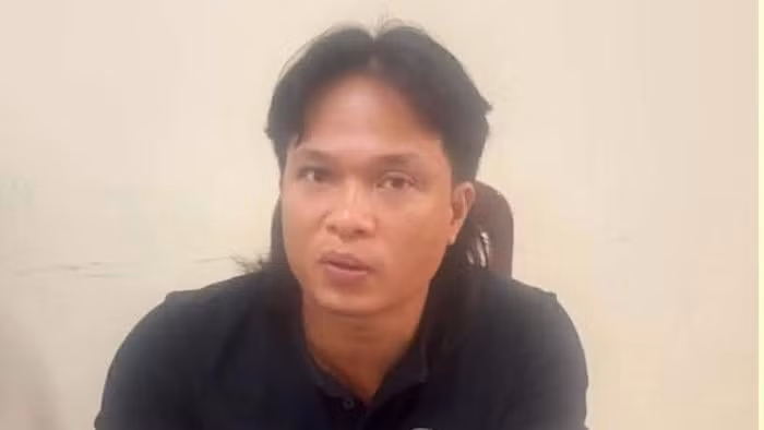 Đối tượng Nguyễn Quang Tuyên làm việc với cơ quan chức năng.