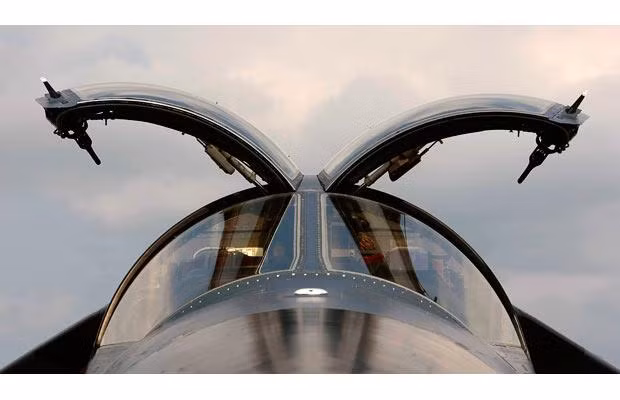 The opened cockpit canopy of a Royal Australian Air Force F-111 Aardvark jet is pictured at the static display area 