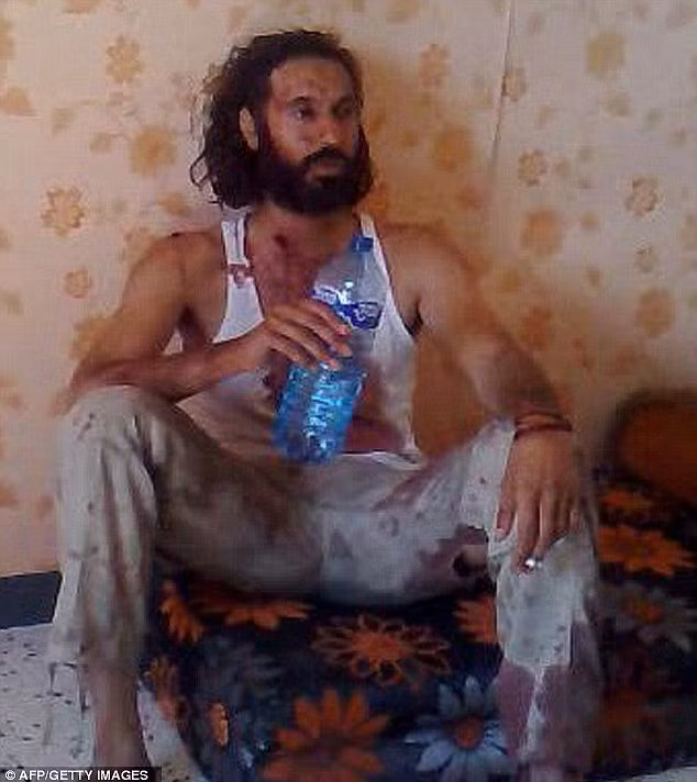 Usually pictured in suits and alongside models at high society events, the dictator’s son was filmed blood-spattered and smoking a cigarette in captivity following the death of his father Read more: http://www.dailymail.co.uk/femail/article-2056263/Vanessa-Hessler-US-model-fired-supporting-Gaddafi-son-Mutassim.html#ixzz1cVsr6LH5