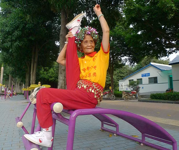 A 72-year-old pensioner shows off her flexibility in a park in Nanning, capital of southern China’s Guangxi Province. According to Tan Zhaoxian her incredible flexibility is thanks to the morning exercises she has done every day since she retired.
