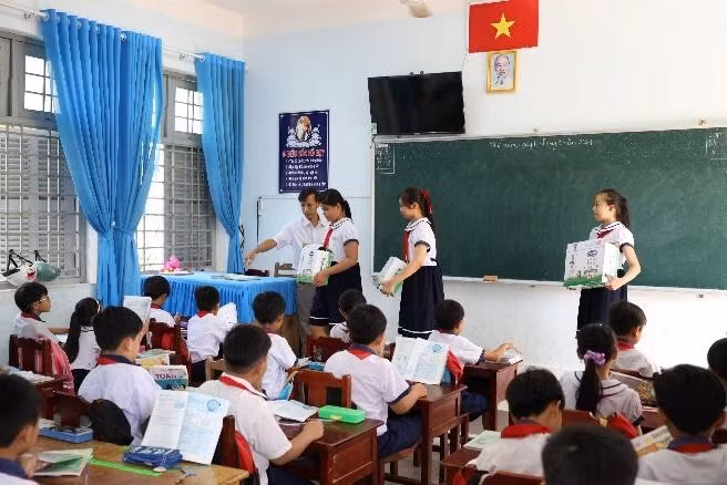 Sữa học đường được triển khai cho trẻ em tại nhiều tỉnh đồng bằng sông Cửu Long ảnh 5