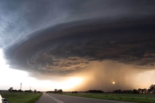 May 28, 2004, on Highway 12, Nebraska: a supercell spins across the countryside. Mike says: 
