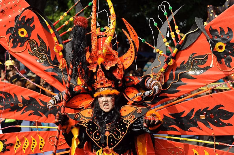A model wearing Kebo Geni costume attends the Banyuwangi Ethno Carnival in Indonesia