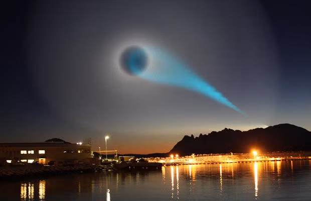 Những hiện tượng kỳ lạ trong năm 2009 ảnh 1 An eerie turquoise light spotted over Norway sparked a mystery, with suggestions it could be a missile test. The light was photographed by Jan Petter Jorgensen while he was on his way to work at a salmon factory