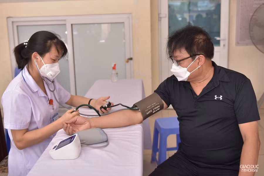 Hà Nội: Bắt đầu tiêm vắc xin Covid-19 quy mô lớn cho người dân ảnh 6