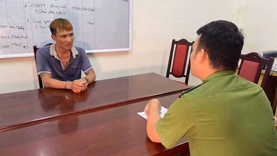 Đối tượng Vũ Văn Hùng làm việc với cơ quan công an.