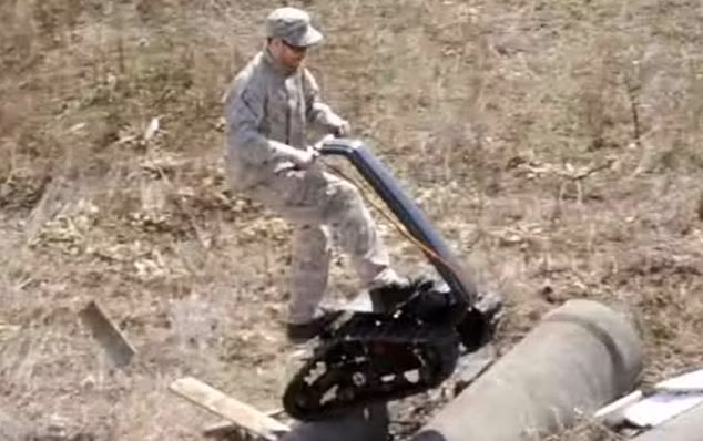 Its tank-like tracks enable it to climb over small obstacles Read more: http://www.dailymail.co.uk/sciencetech/article-1311661/The-DTV-Shredder-The-incredible-motorised-skateboard-looks-like-tank.html#ixzz0zSe2etWq
