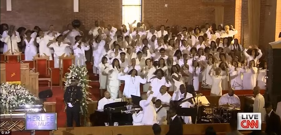 Traditional home-going service: The New Hope Mass Choir and the New Jersey Mass Choir, all in white, sand and rejoiced inside the New Hope Baptist Church as guests arrived Read more: http://www.dailymail.co.uk/news/article-2102985/Whitney-Houston-Funeral-A-galaxy-stars-gather-New-Jersey-say-goodbye-pop-legend.html#ixzz1mnE7a02P