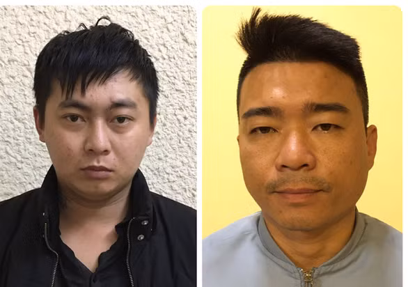 Nguyễn Trọng Toại (trái) và Chu Danh Giang tại cơ quan chức năng
