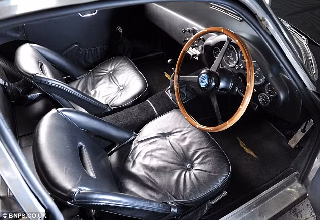 1,23 triệu bảng Anh cho chiếc Aston Martin cực hiếm ảnh 2 Leather interior: The Sanction II cars include an engine built to 4.2-litre specification and a 35-gallon fuel tank Read more: http://www.dailymail.co.uk/news/article-2151109/Aston-Martin-goes-1-23m-collection-46-British-classic-cars-hammer-record-breaking-sale.html#ixzz1wDp6pD5X